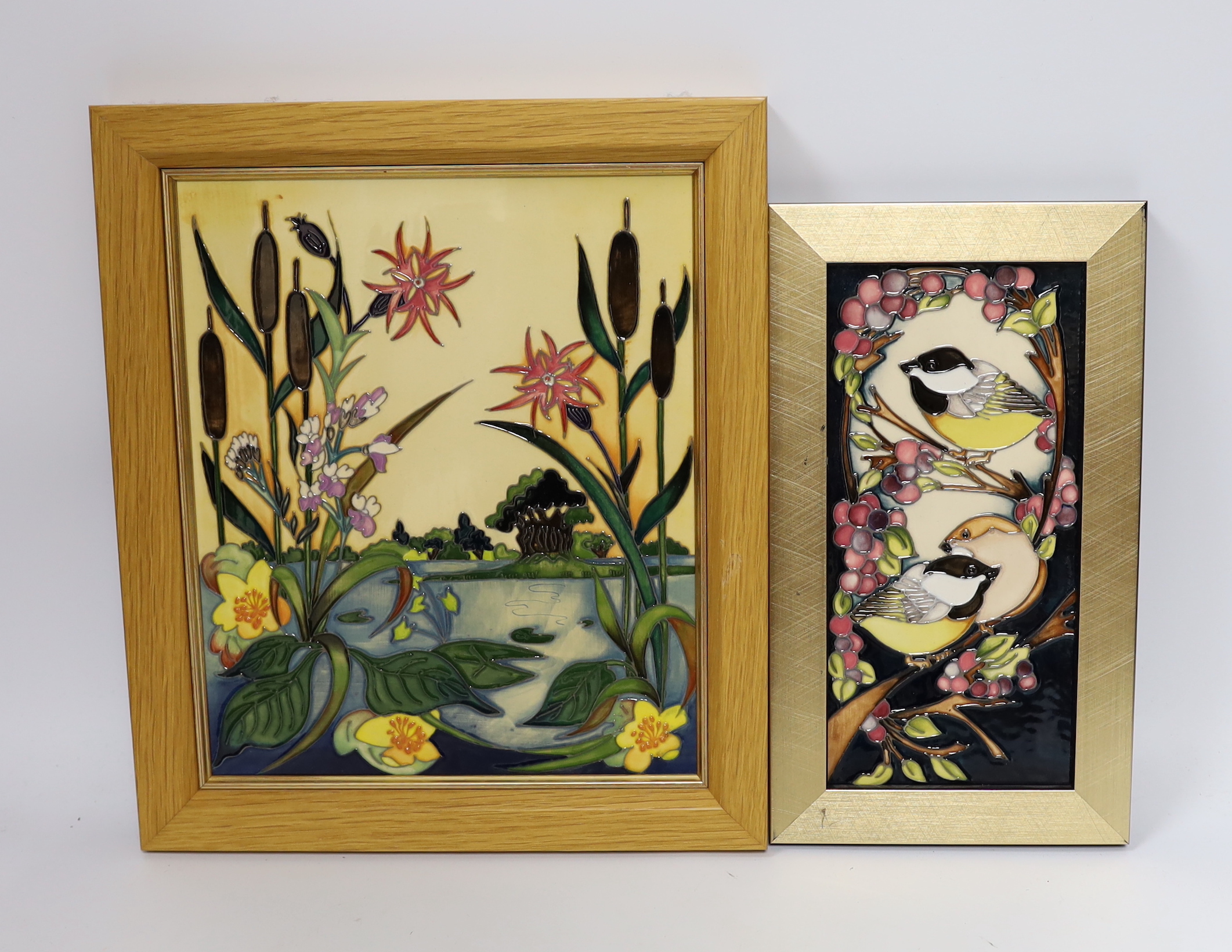 A Moorcroft Rachel Bishop wall plaque of bulrushes, another similar plaque and a signed print by Paul Hilditch, ‘A Vision of Windsor’, largest overall 60cm x 48cm